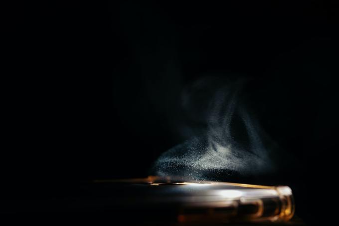 Dust cloud illuminated in darkness