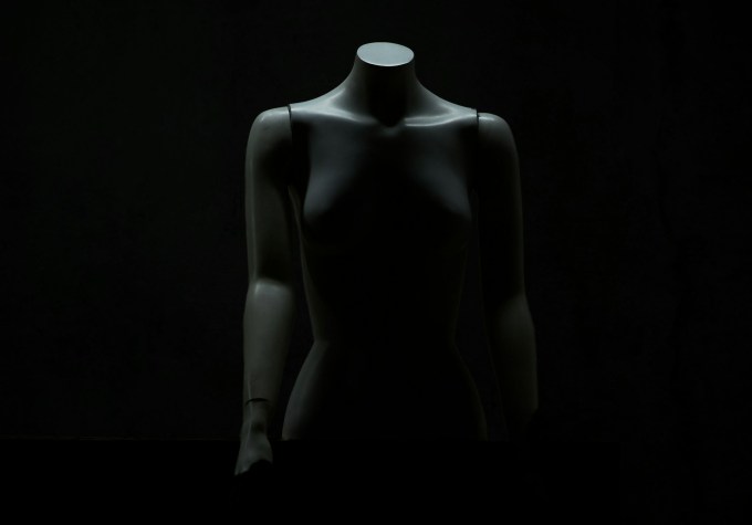 Mannequin torso on a dark background